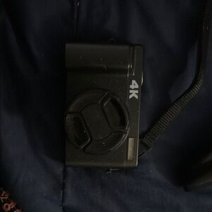 Black 4K Camera with Strap